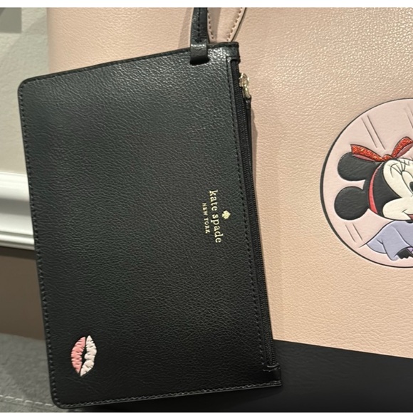 Kate Spade Pink and Black Minnie Mouse Tote
Retail Price is 379.00 - Picture 2 of 6